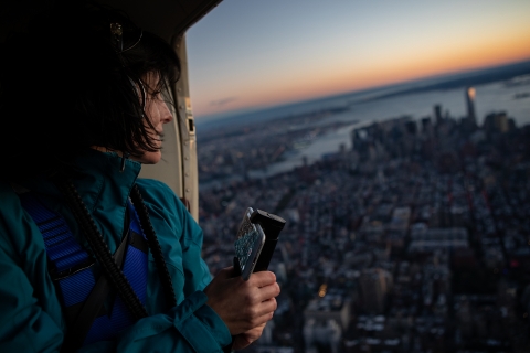 fly with Flynyon over New York City State of Liberty at the sunset